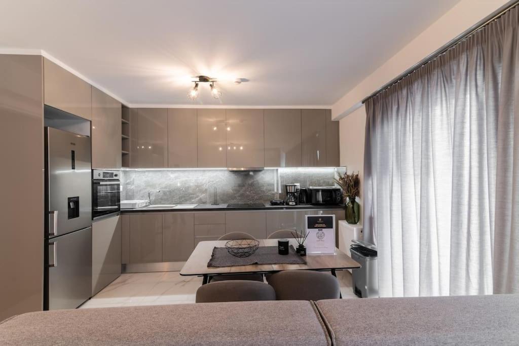 Ferienwohnung Μεζονέτα Με Θέα Στο Πάρκο Σταύρος Νιάρχος One Athen Exterior foto